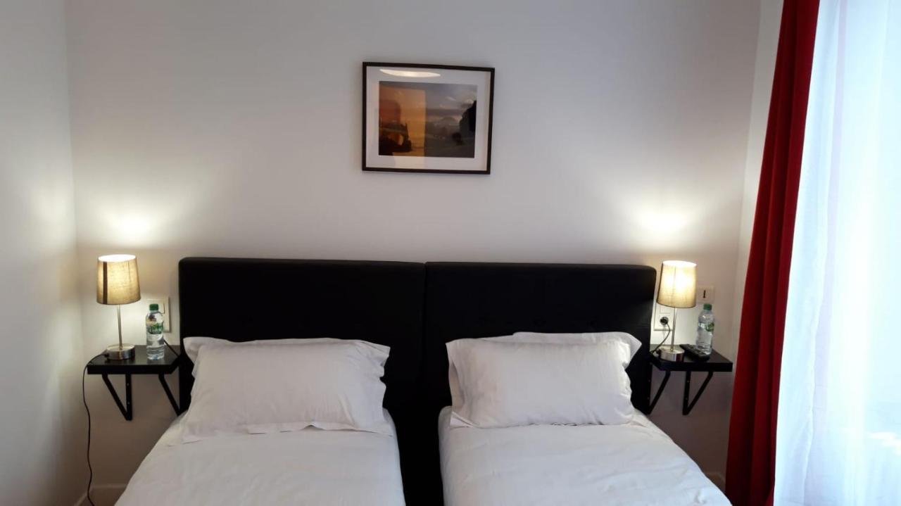 Les Chambres De L'Hostellerie Du Commerce Gelles Pokoj fotografie